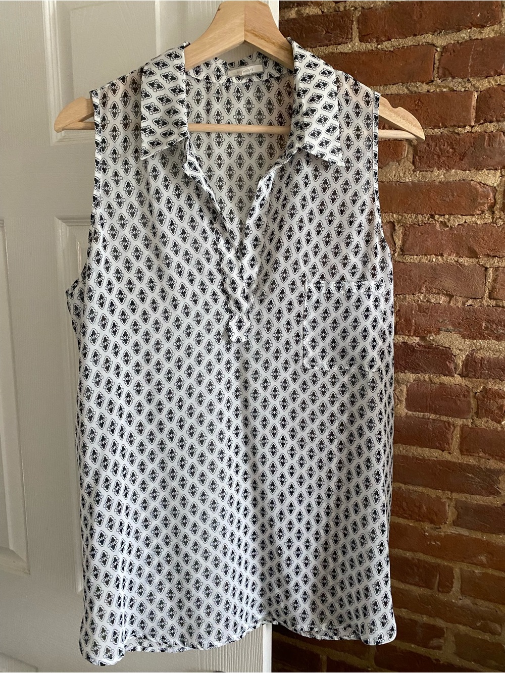 Pleione Sleeveless Collared Pocket Tunic Blouse
